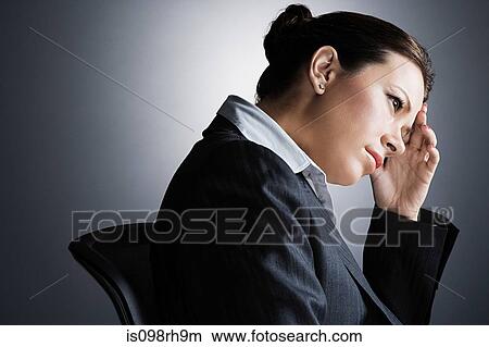Picture - Stressed businesswoman. Fotosearch