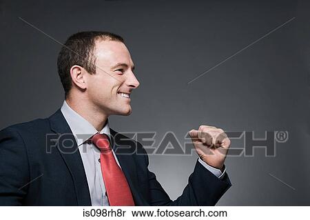 Triumphant businessman View Large Photo Image Stock Photography - Triumphant businessman. Fotosearch