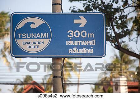 Stock Image - Tsunami evacuation sign in phuket. Fotosearch