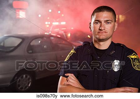 Stock Photo - Police officer at scene of accident. Fotosearch