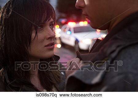 Stock Photography - Young couple involved in road accident. Fotosearch