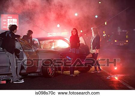 Stock Image - Young people involved in car crash. Fotosearch