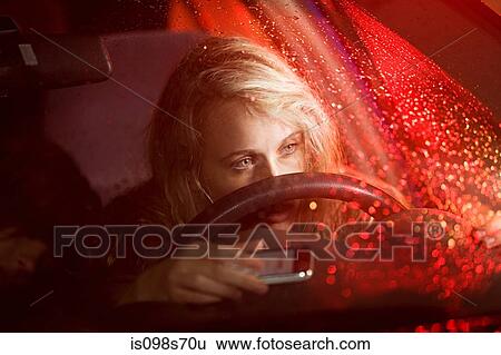 Stock Photograph - Young woman in car accident. Fotosearch