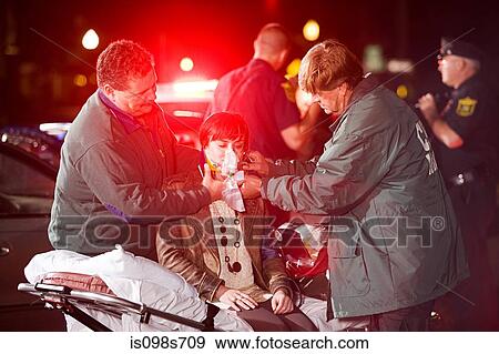 Stock Photo - Young woman receiving medical treatment. Fotosearch