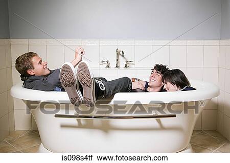 Friends in a bathtub View Large Photo Image Stock Image - Friends in a bathtub. Fotosearch