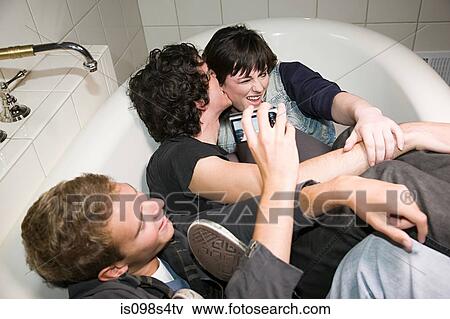 Friends in a bathtub View Large Photo Image Stock Photo - Friends in a bathtub. Fotosearch