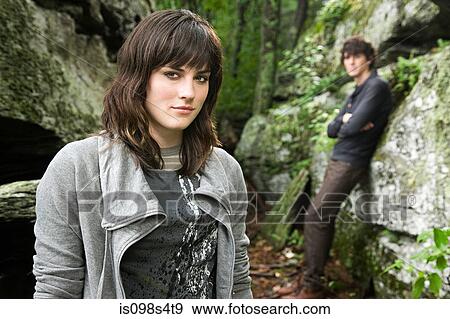 Young couple by rocks View Large Photo Image Stock Photo - Young couple by rocks. Fotosearch