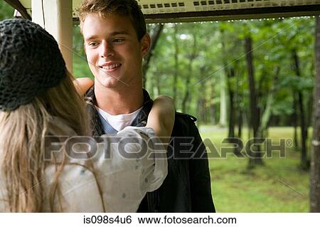 Stock Photograph - Young couple outdoors. Fotosearch