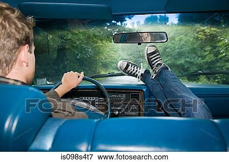 Stock Photo - Young people in car. Fotosearch