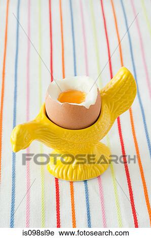 Boiled egg in eggcup View Large Photo Image Stock Image - Boiled egg in eggcup. Fotosearch