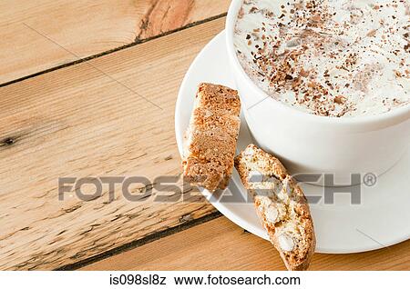 Cappuccino and biscotti View Large Photo Image Stock Photo - Cappuccino and biscotti. Fotosearch