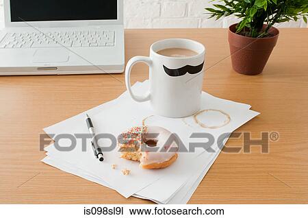 Coffee and doughnut on desk View Large Photo Image Stock Image - Coffee and doughnut on desk. Fotosearch