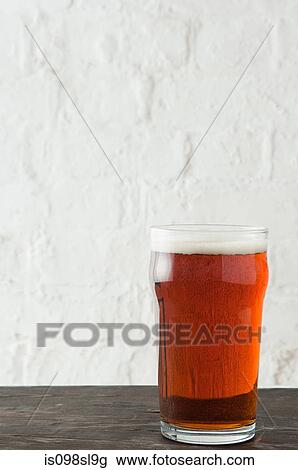 Pint of bitter ale View Large Photo Image Stock Image - Pint of bitter ale. Fotosearch