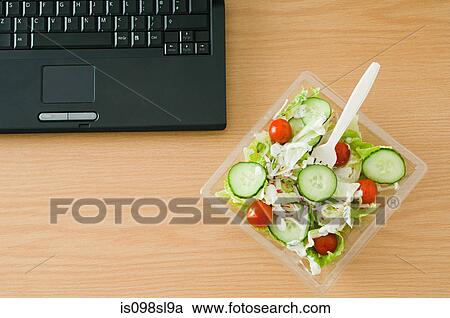 Salad at desk View Large Photo Image Stock Image - Salad at desk. Fotosearch