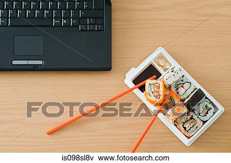 Sushi and laptop View Large Photo Image Stock Photo - Sushi and laptop. Fotosearch