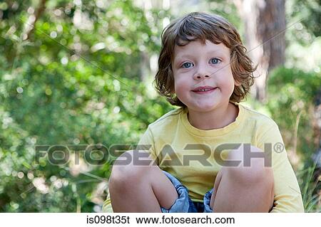 Boy outdoors View Large Photo Image Stock Photograph - Boy outdoors. Fotosearch