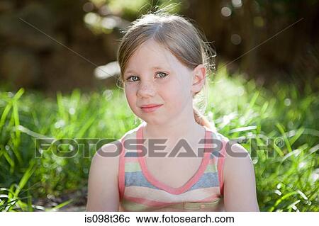 Stock Image - Portrait of a girl outdoors. Fotosearch