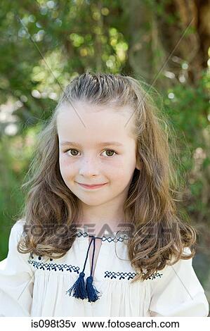 Portrait of a girl outdoors View Large Photo Image Stock Photo - Portrait of a girl outdoors. Fotosearch