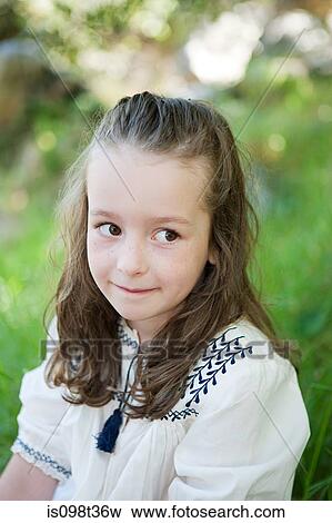 Portrait of a girl outdoors View Large Photo Image Stock Photo - Portrait of a girl outdoors. Fotosearch
