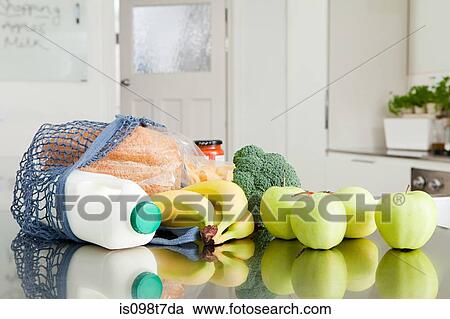 Groceries on kitchen counter View Large Photo Image Stock Image - Groceries on kitchen counter. Fotosearch