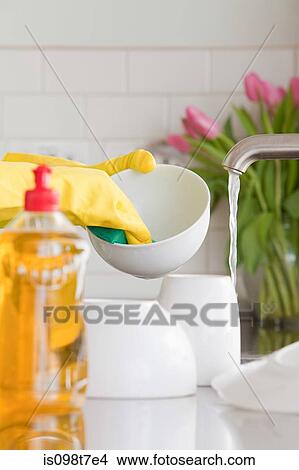 Picture - Person washing up. Fotosearch