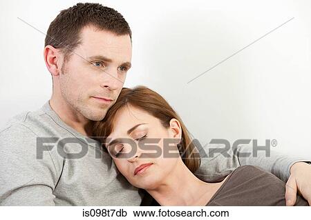 Sleeping woman resting on husband View Large Photo Image Stock Image - Sleeping woman resting on husband. Fotosearch