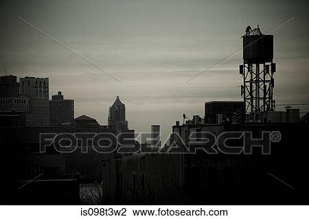 Water tower and buildings in new york View Large Photo Image Stock Image - Water tower and buildings in new york. Fotosearch