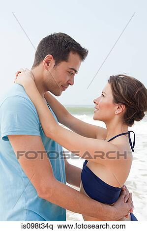 Stock Photography - Loving couple by the sea. Fotosearch