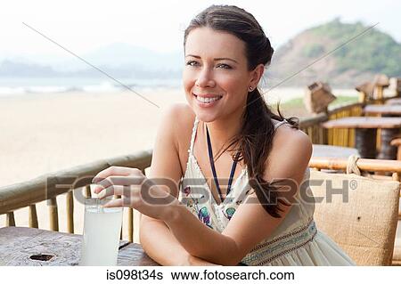 Woman at beach bar View Large Photo Image Stock Photograph - Woman at beach bar. Fotosearch