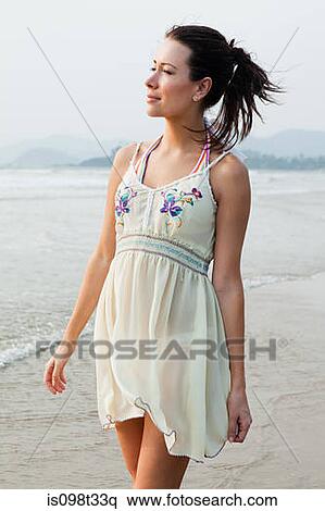Young woman by the sea View Large Photo Image Stock Photography - Young woman by the sea. Fotosearch