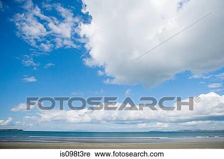 Stock Image - Auckland, big clouds over Hauraki Gulf. Fotosearch