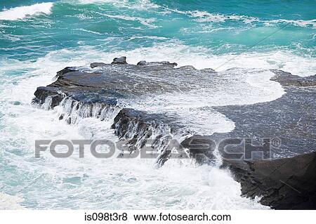 Auckland, surf washing over rocks at Muriwai Beach View Large Photo Image Stock Photo - Auckland, surf washing over rocks at Muriwai Beach. Fotosearch