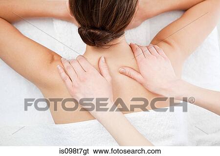 Woman having a massage View Large Photo Image Stock Photograph - Woman having a massage. Fotosearch