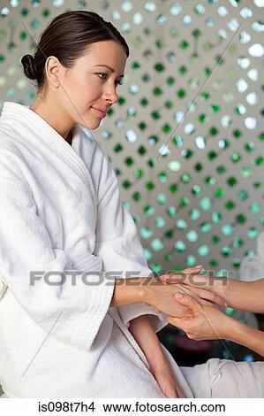 Woman having hand massage View Large Photo Image Picture - Woman having hand massage. Fotosearch