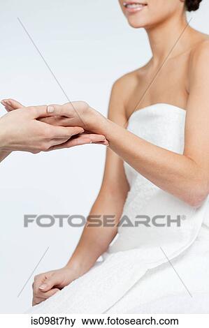 Woman having hand massage View Large Photo Image Stock Photo - Woman having hand massage. Fotosearch