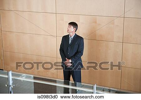 Businessman looking up View Large Photo Image Stock Image - Businessman looking up. Fotosearch