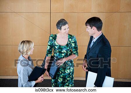 Businesspeople talking View Large Photo Image Stock Photo - Businesspeople talking. Fotosearch