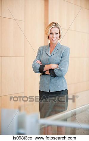 Businesswoman in office View Large Photo Image Stock Image - Businesswoman in office. Fotosearch