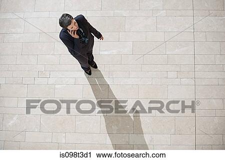 Businesswoman on cellphone View Large Photo Image Stock Image - Businesswoman on cellphone. Fotosearch
