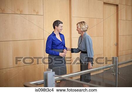 Businesswomen smiling View Large Photo Image Picture - Businesswomen smiling. Fotosearch