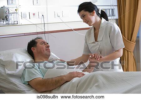 Nurse caring for patient View Large Photo Image Picture - Nurse caring for patient. Fotosearch