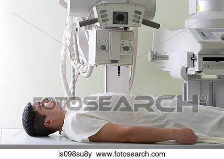 Patient and x-ray machine View Large Photo Image Stock Photo - Patient and x-ray machine. Fotosearch
