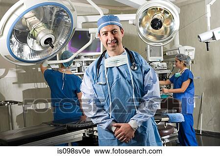 Surgeons in operating room View Large Photo Image Stock Image - Surgeons in operating room. Fotosearch