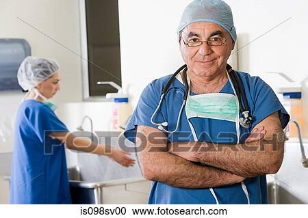 Stock Image - Surgeons in scrubs. Fotosearch