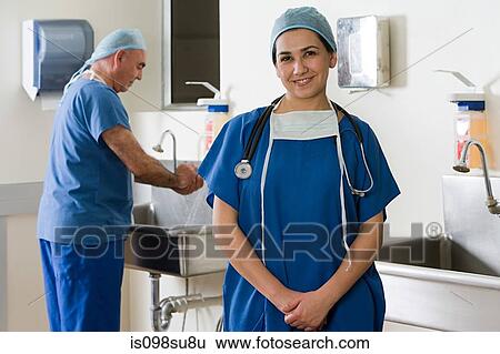 Surgeons in scrubs View Large Photo Image Stock Photograph - Surgeons in scrubs. Fotosearch