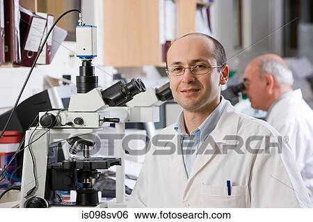 Technician in laboratory View Large Photo Image Stock Photograph - Technician in laboratory. Fotosearch