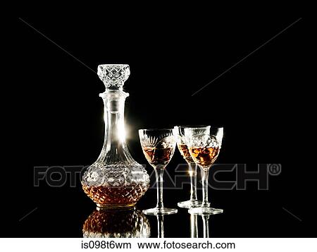 Brandy in decanter and glasses View Large Photo Image Picture - Brandy in decanter and glasses. Fotosearch