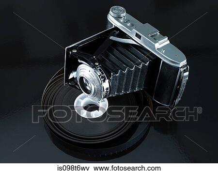 Camera and roll of film View Large Photo Image Stock Photo - Camera and roll of film. Fotosearch