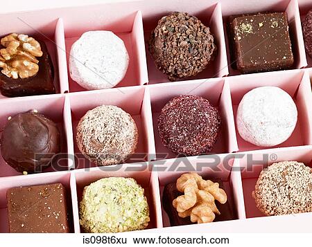 Chocolates in box View Large Photo Image Stock Photograph - Chocolates in box. Fotosearch