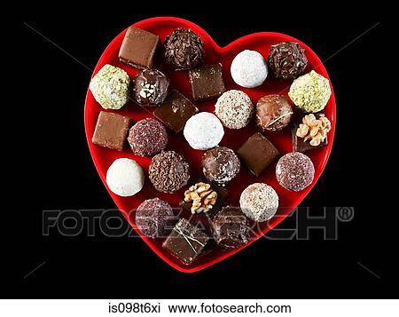 Chocolates in heart shape View Large Photo Image Stock Image - Chocolates in heart shape. Fotosearch